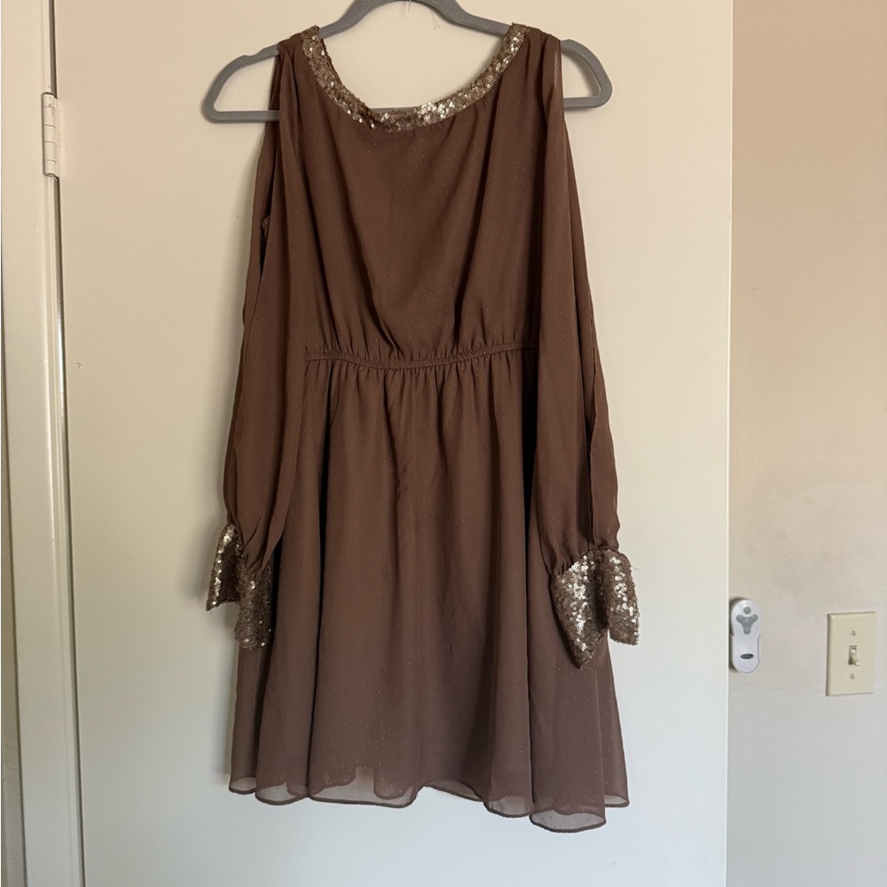 Elegant brown dress featuring shimmering sequin accents, the neckline and cuffs